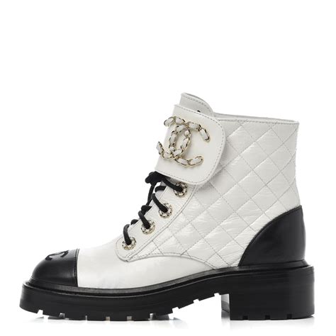 black and white chanel boots